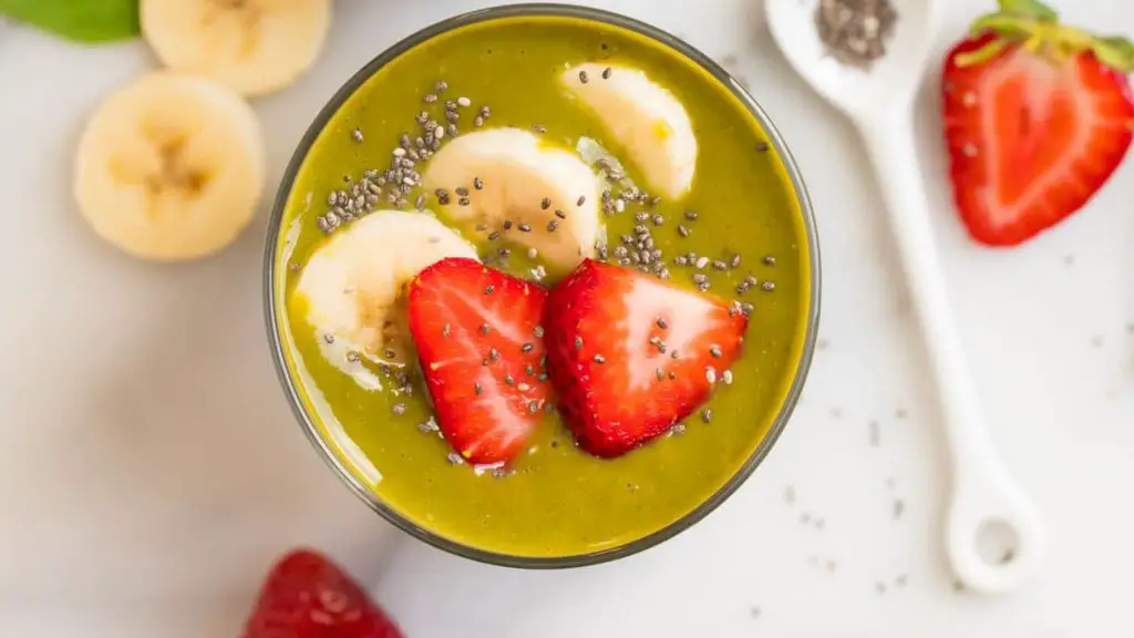 strawberry green smoothie with banana and chia seeds